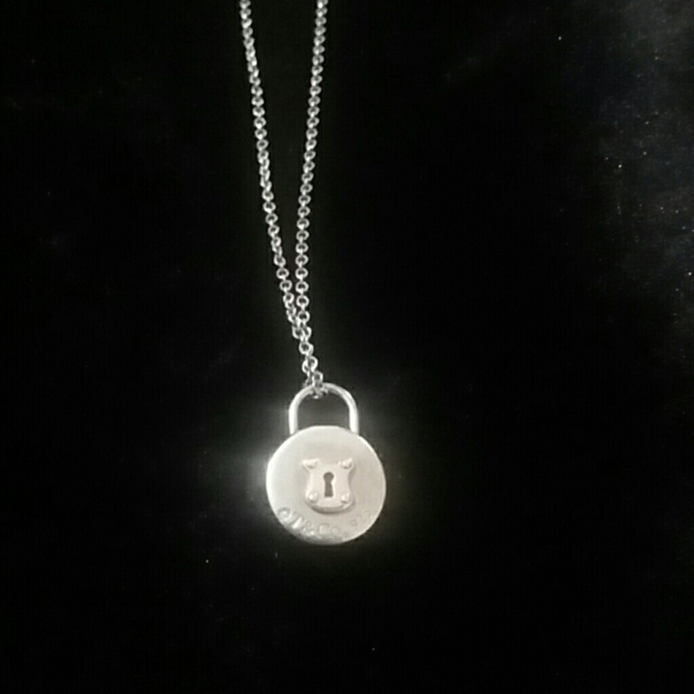 Tiffany & co. mini lock necklace with bag and box